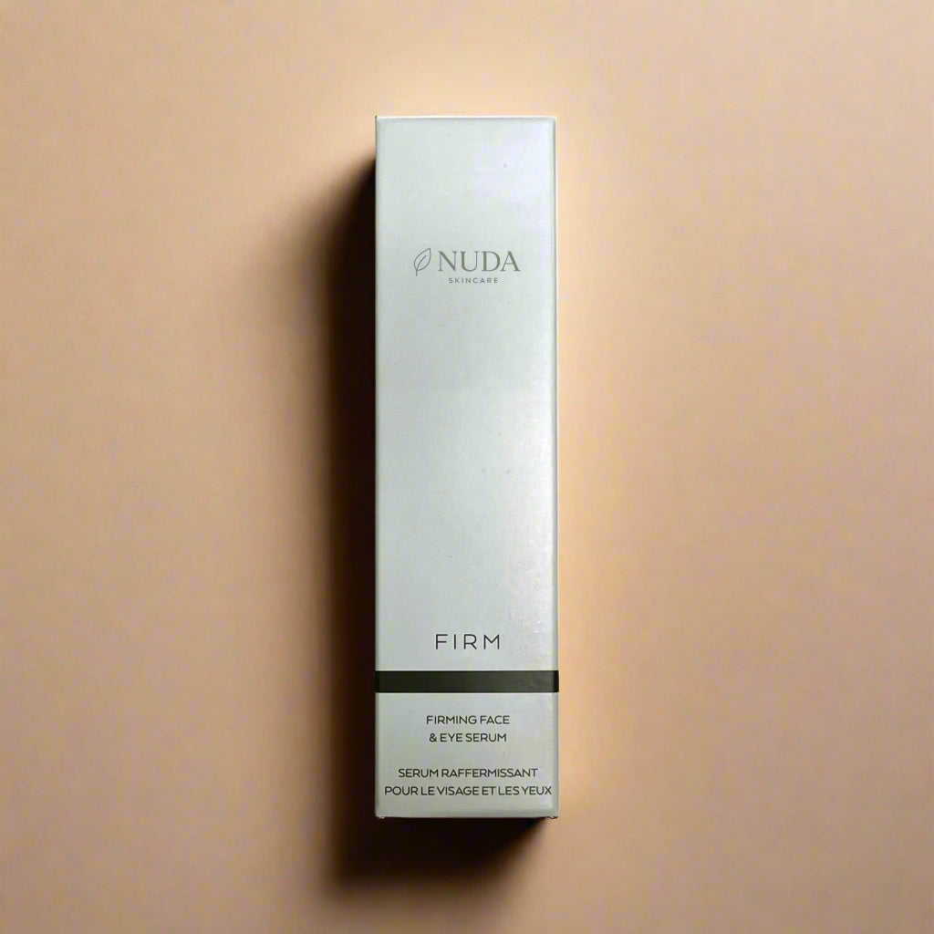 Nuda Firming Face & Eye Serum packaging on a white background